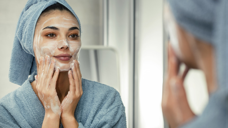 Woman using face wash