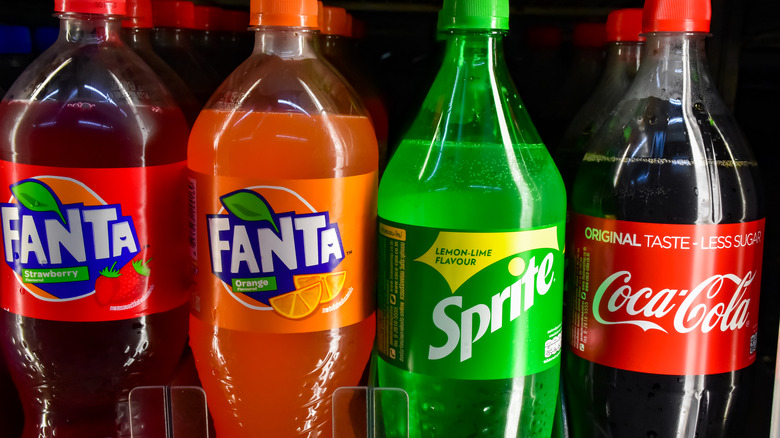 bottles of sodas on shelves