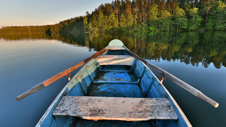 empty canoe on a serene lake