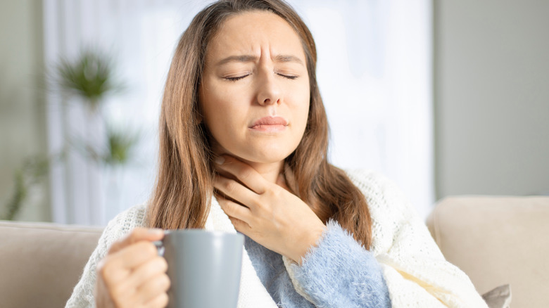 woman with sore throat