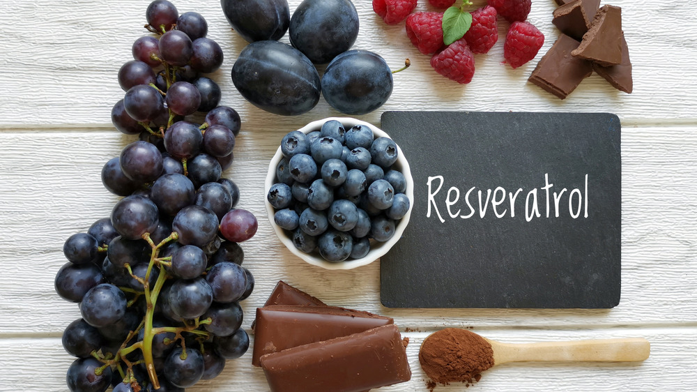 Foods rich in resveratrol, word 'resveratrol' written on chalkboard