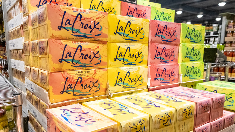 stacked boxes of La Croix waters