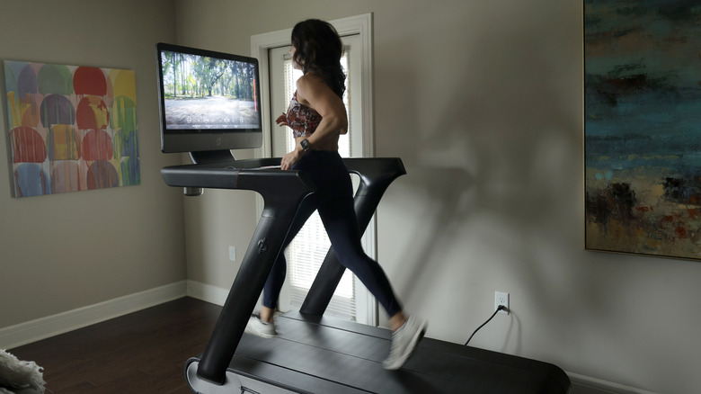 woman running on treadmill 