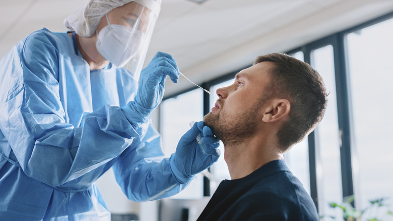 Man getting a COVID-19 test