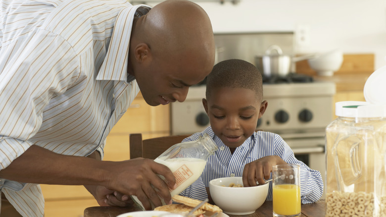 father and son at breakfast