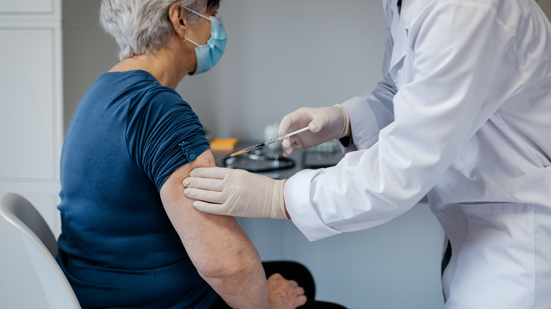 Woman being vaccinated