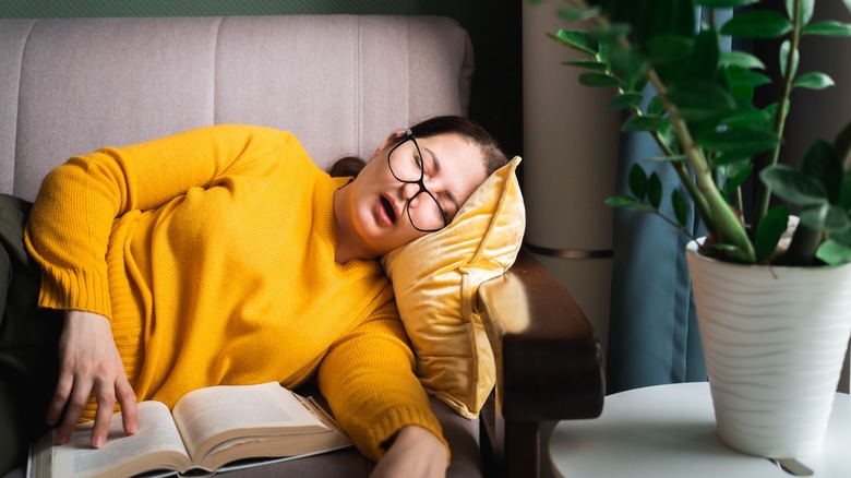 person sleeping on couch