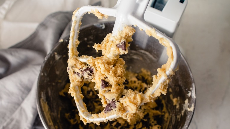 chocolate chip cookie dough in a stand mixer