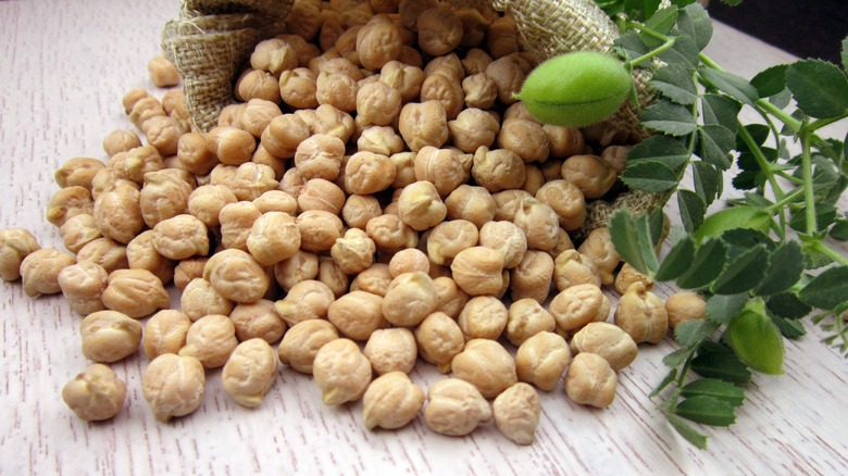 chickpeas falling out of a sack