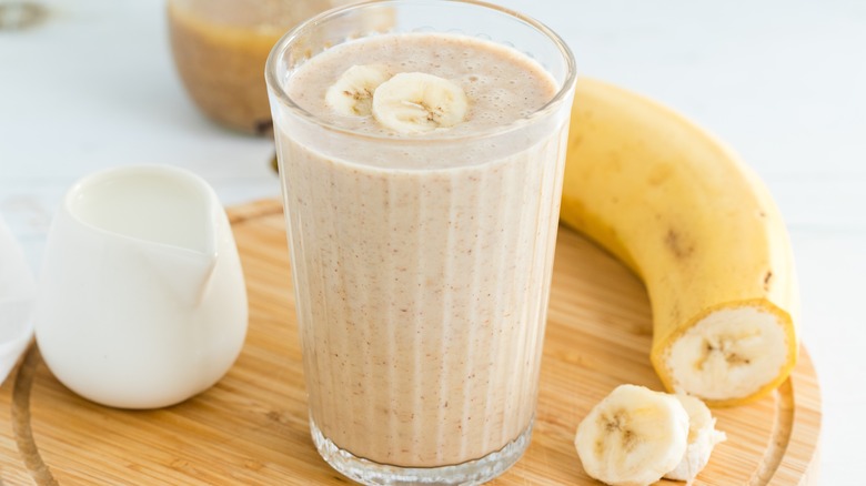 woman drinking a homemade smoothie