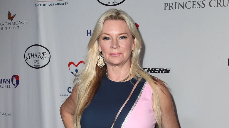 Jackie Siegel in pink and blue dress