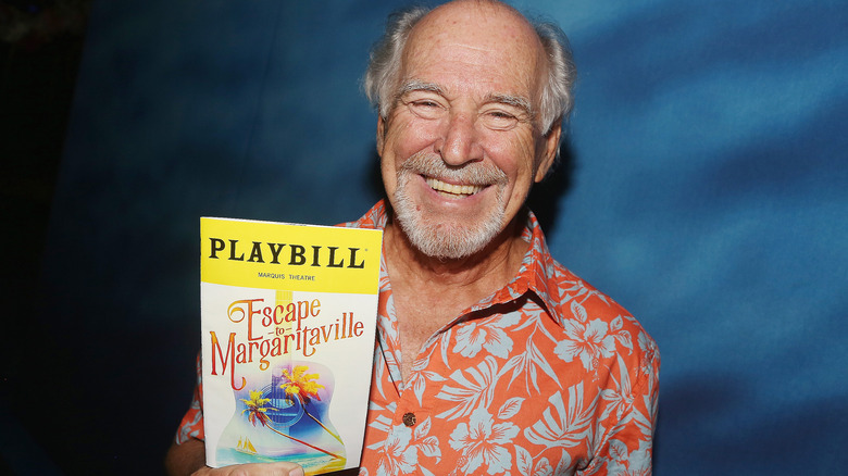 Jimmy Buffett holding playbill