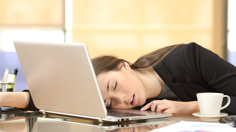 woman asleep at desk