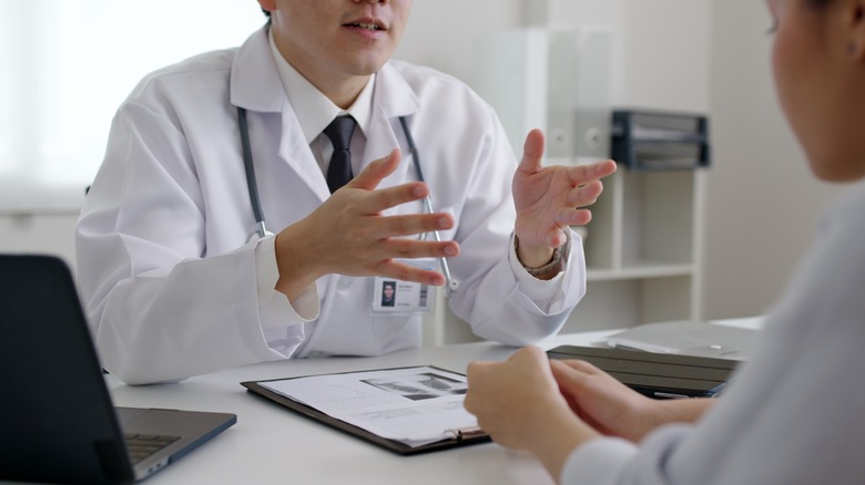 A doctor talks to a patient