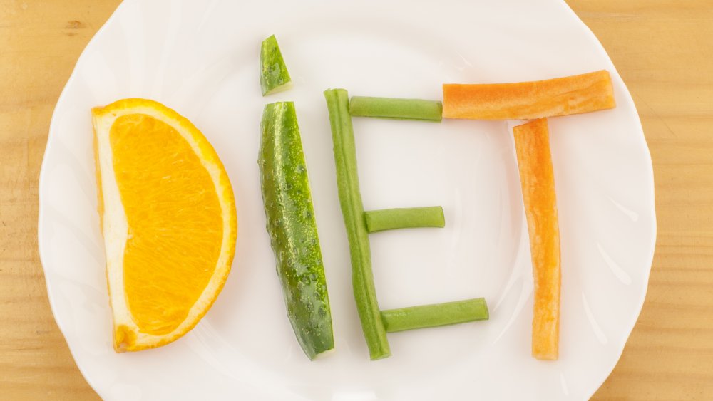 Diet spelled out in fruits and vegetables.