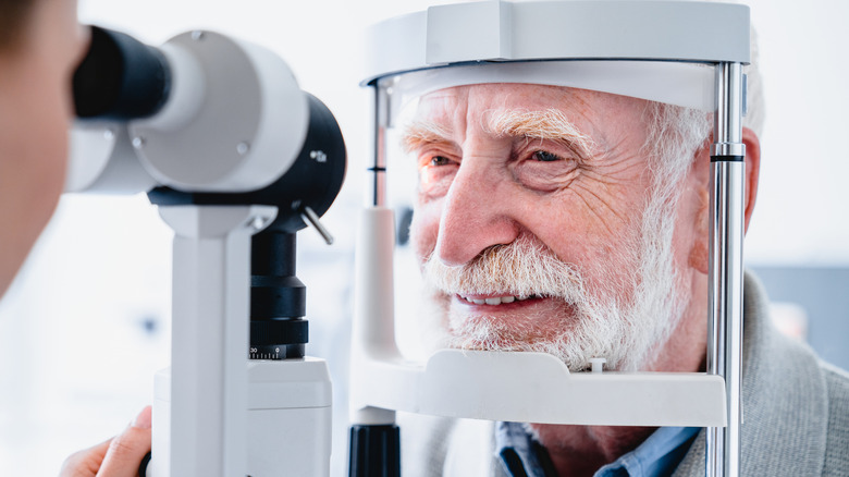 older man getting eye examination
