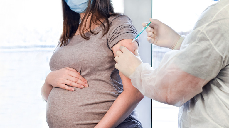 pregnant woman getting vaccinated