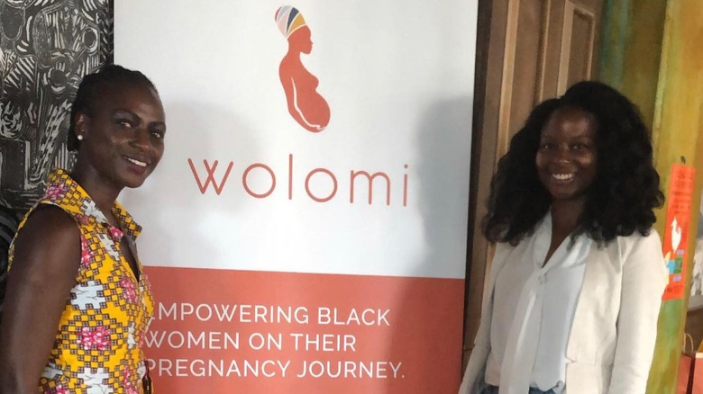 Layo George and a #WolomiMom attending Wolomi event