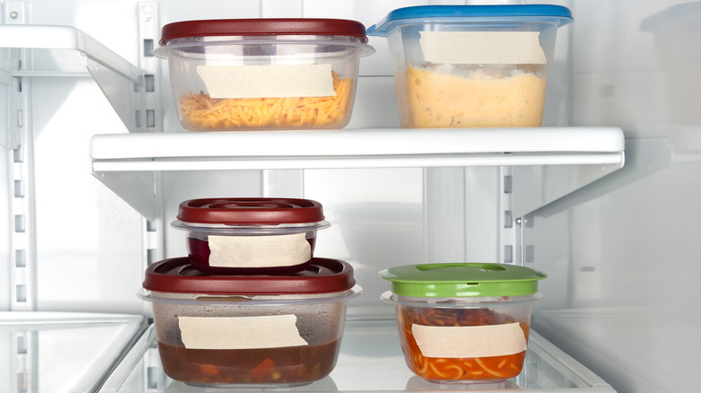 containers of leftovers in fridge