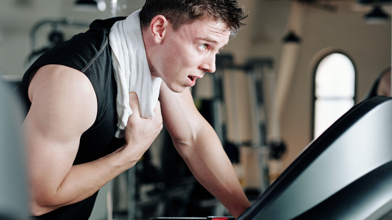 Tired athlete on treadmill