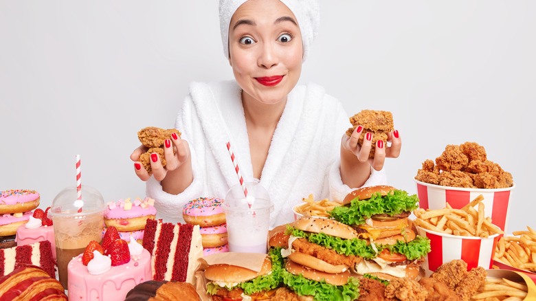 woman surrounded by plenty food