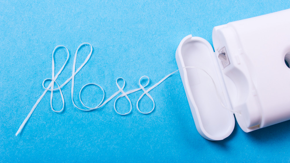 Dental floss spelling out the word floss