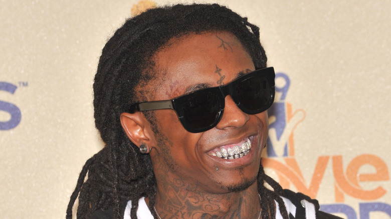 Lil Wayne wearing black sunglasses