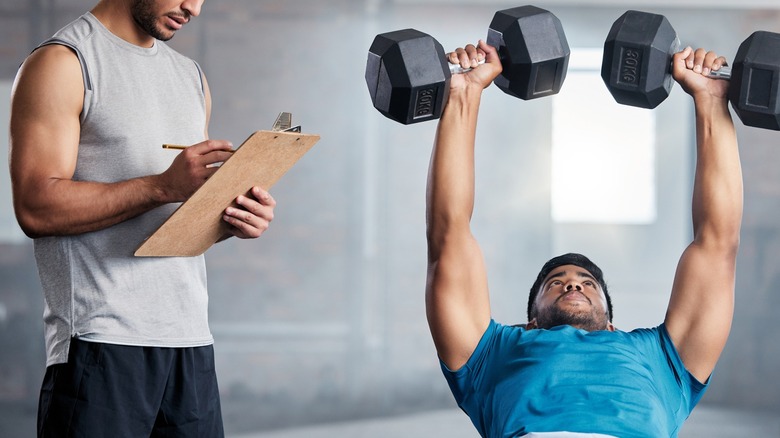 men lifting weights
