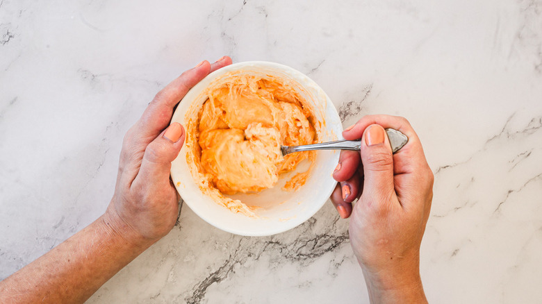 cheese and cream cheese in bowl