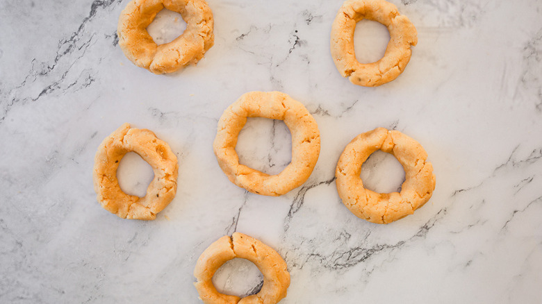 raw bagels on marble