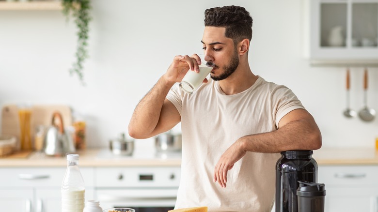 man drinking protein shake