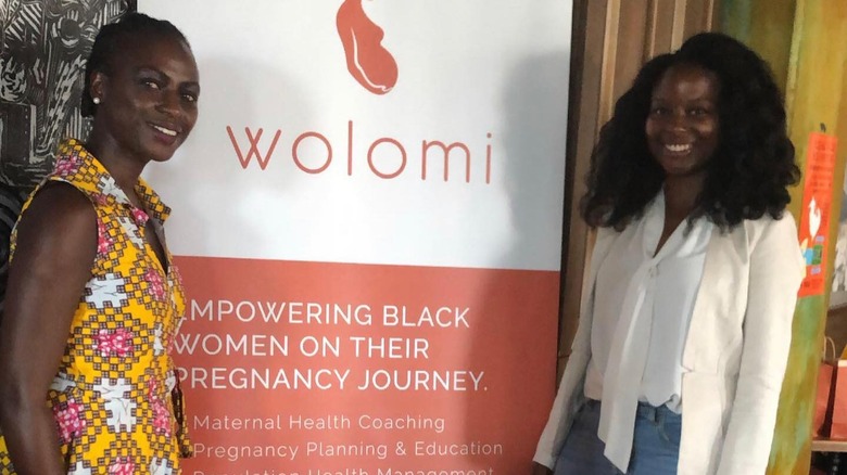 Layo George and a #WolomiMom attending a Wolomi event