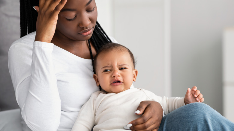 Black mother struggling with being a new parent