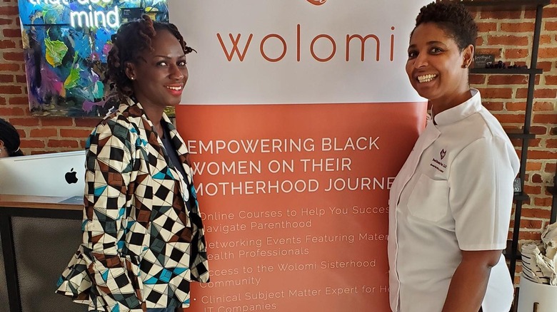 Layo George and a #WolomiMom at a Wolomi event