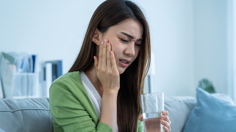 Woman with mouth pain