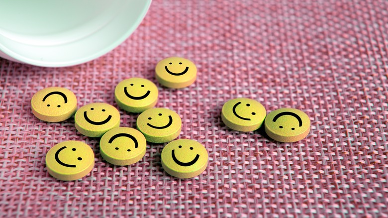 Yellow pills with happy face