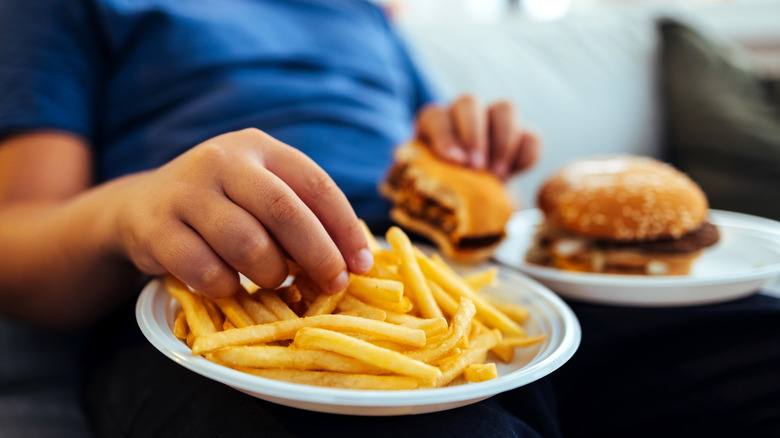 Person eating fast food