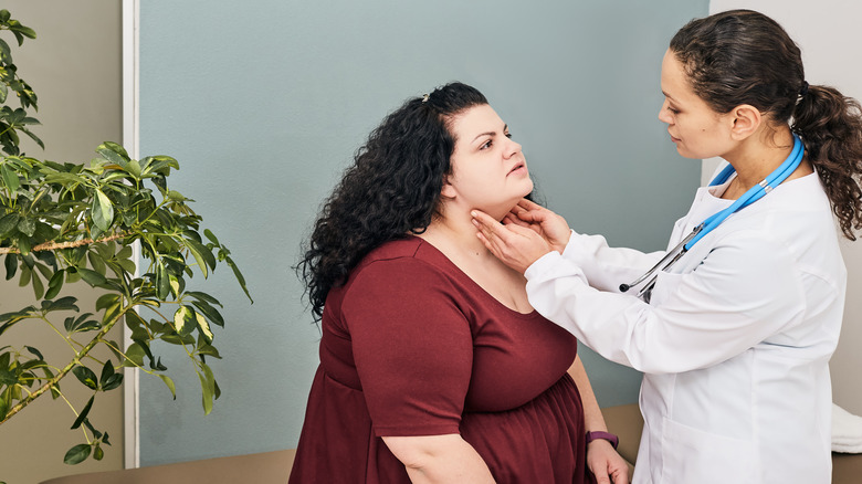 Woman being examined by doctor