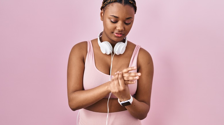 Young woman with hand pain