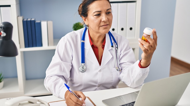 Doctor prescribing medication