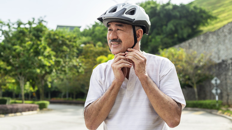 man wearing bicycle helmet