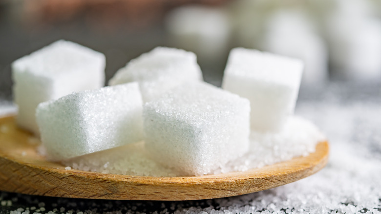 Cubes of sugar on plate