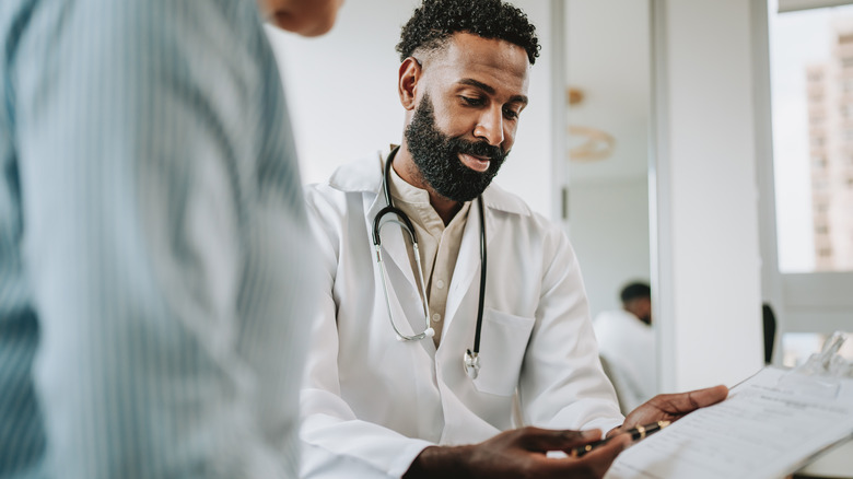 doctor talking to patient