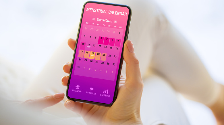 closeup of period tracker app on cell phone