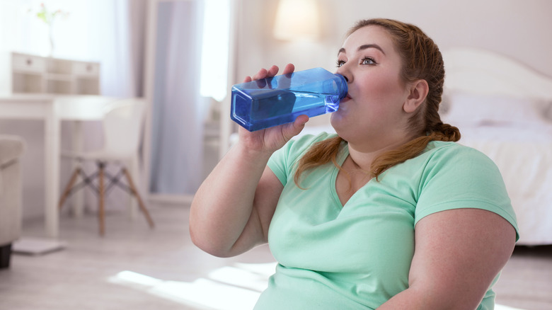 woman drinking water