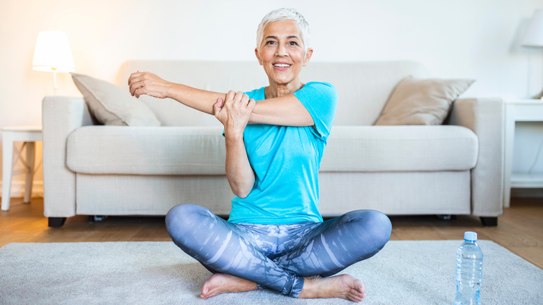 woman stretching as a warmup