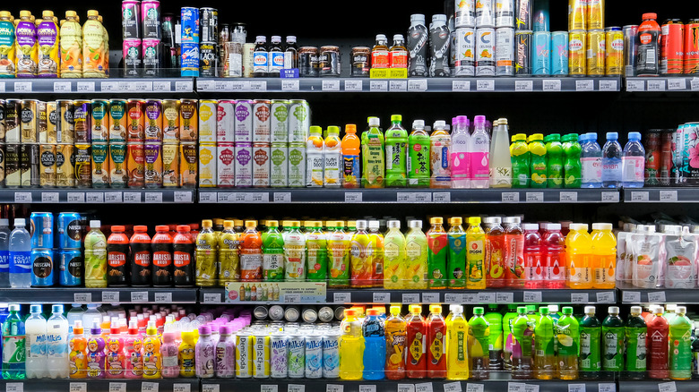 shelves stocked with sweetened drinks