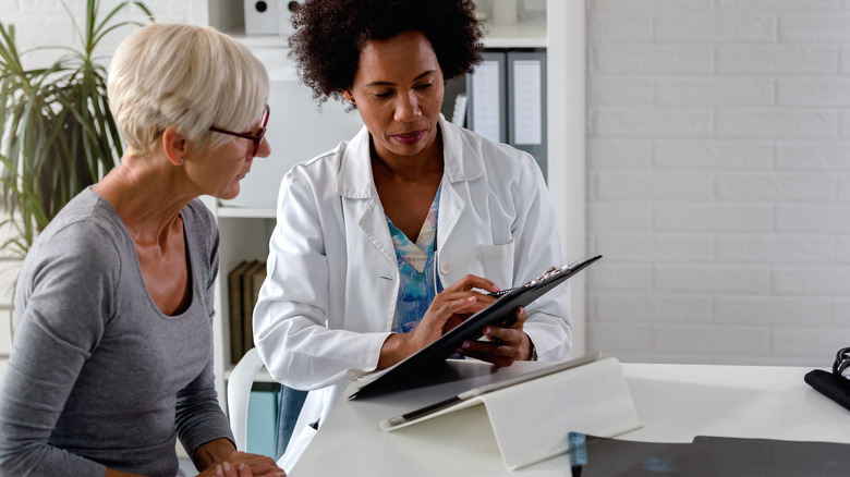 doctor speaking with patient