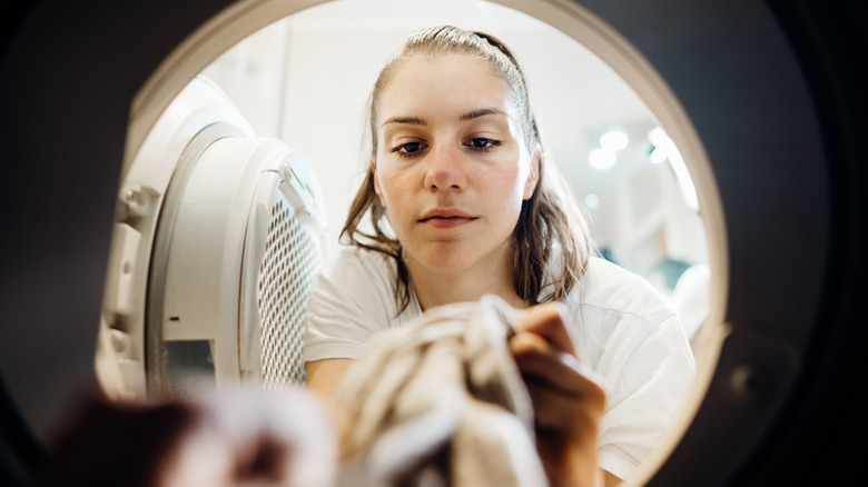 girl washing her underwear