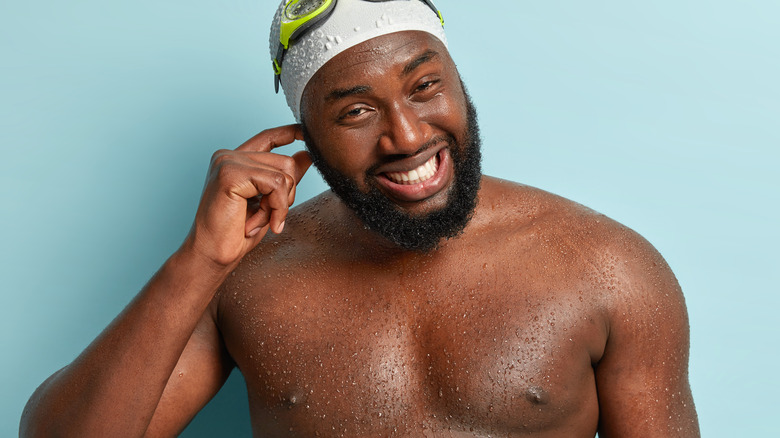 swimmer with water in ear